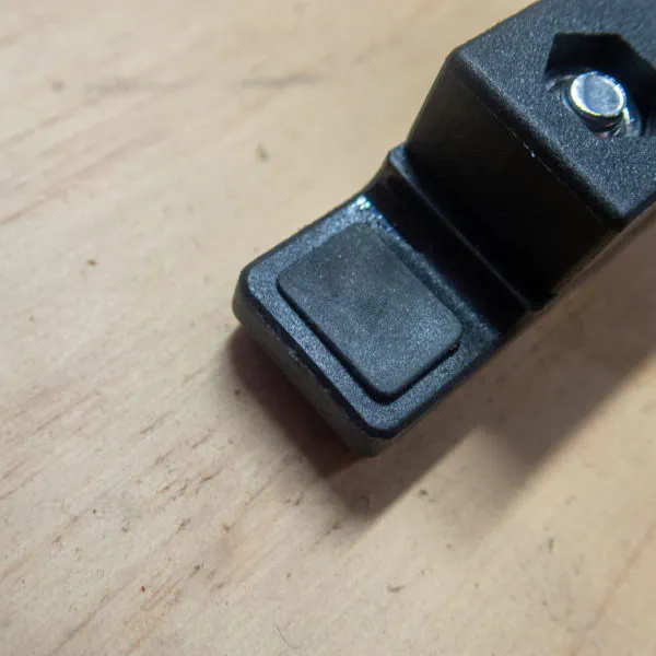 Up-close view of the Topeak Omni Quick­track Adapter mount­ing brack­et foot