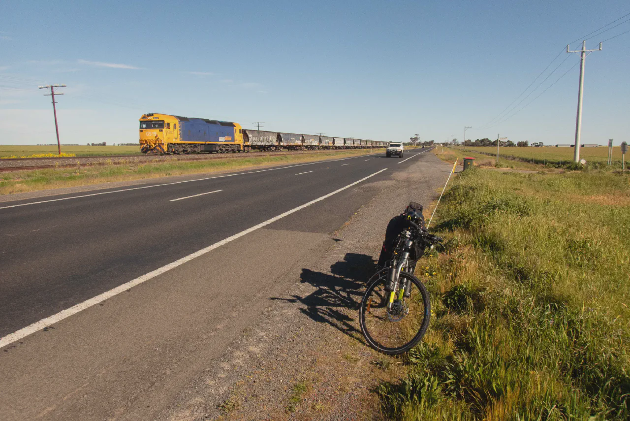 Freight train passing on the Western Highway between Horsham and Pimpinio